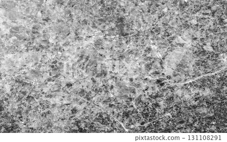 Granite surface showcasing intricate details and textures Granite surface showcasing intricate details and textures 131108291