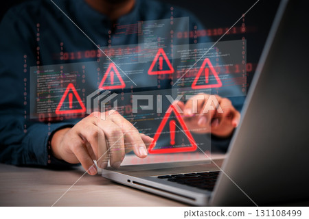 Cybersecurity warning with coding glitch and malware alert shown on digital interface, representing data breach and system vulnerability.Hacking attempt detected with virus icons on computer screen. 131108499