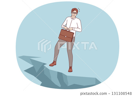 Challenge for business man standing at edge of abyss, blindfolded, and in need of help of guide 131108548