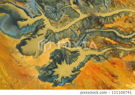 Aerial view of colorful contaminated cyanide residuals waters from gold mine. Abstract nature pattern 131108741