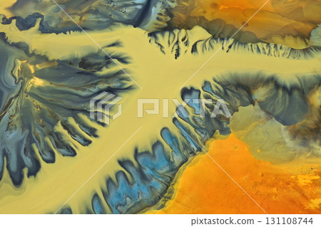 Aerial view of colorful contaminated cyanide residuals waters from gold mine. Abstract nature pattern Aerial view of colorful contaminated cyanide residuals waters from gold mine. Abstract nature pattern 131108744