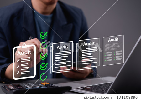 Accountant reviewing audit checklist and verifying compliance with financial documents. Suitable for audit team, financial reporting, and business audit visuals. Accountant reviewing audit checklist and verifying compliance with financial documents. Suitable for audit team, financial reporting, and business audit visuals. 131108896