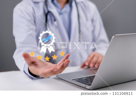 Doctor reviewing and rating healthcare service online with digital certificate and five stars. Great for medical feedback, telemedicine, and patient satisfaction. 131108911