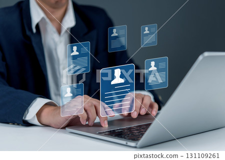 HR manager evaluating resumes and applicant data using online platform hiring, modern recruitment, talent search, and job applications. employment analytics, and profile management. 131109261