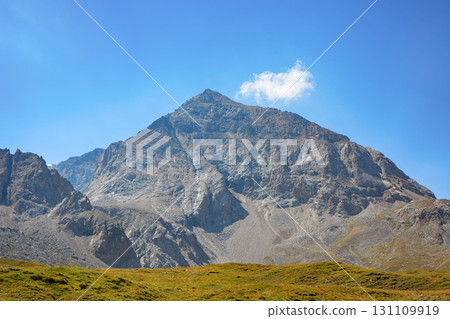 Idyllic summer landscape with hiking trail in the mountains with beautiful clouds, National park. Nice view. Alai ridge mountains Idyllic summer landscape with hiking trail in the mountains with beautiful clouds, National park. Nice view. Alai ridge mountains 131109919