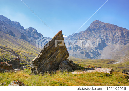 Idyllic summer landscape with hiking trail in the mountains with beautiful stones, National park. Nice view. Alai ridge mountains Idyllic summer landscape with hiking trail in the mountains with beautiful stones, National park. Nice view. Alai ridge mountains 131109926