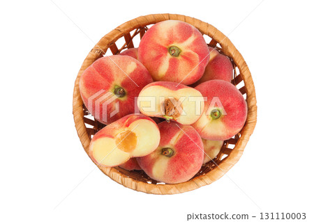 chinese flat donut peaches in a wicker basket isolated on white background. Top view. Flat lay chinese flat donut peaches in a wicker basket isolated on white background. Top view. Flat lay 131110003