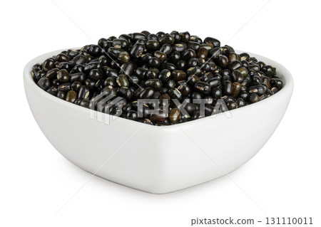 Black bean or Urad dal, black gram, vigna mungo in ceramic bowl isolated on the white background Black bean or Urad dal, black gram, vigna mungo in ceramic bowl isolated on the white background 131110011