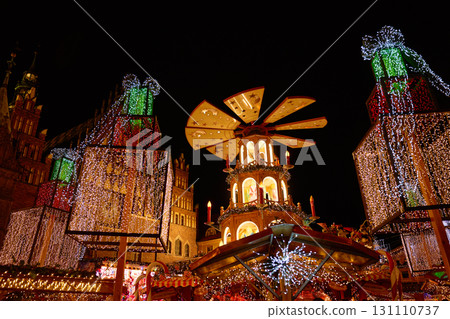 Christmas fair with festive lights and decorations in historic city center Christmas fair with festive lights and decorations in historic city center 131110737