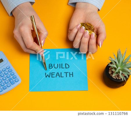 Build wealth concept. Process of accumulating valuable assets and resources over time through saving, investing, and managing money wisely to increase financial security. Woman points to a message Build wealth concept. Process of accumulating valuable assets and resources over time through saving, investing, and managing money wisely to increase financial security. Woman points to a message 131110766