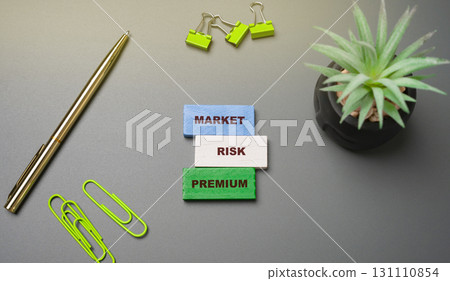 Market risk premium is the extra return investors expect to earn from holding a market portfolio of risky assets instead of risk-free assets, compensating for the higher risk involved. Block with word Market risk premium is the extra return investors expect to earn from holding a market portfolio of risky assets instead of risk-free assets, compensating for the higher risk involved. Block with word 131110854