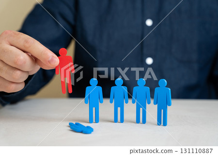 Company director chooses the red figurine of people from the team of employees instead of the blue one. The concept of dismissing a worker and reducing staff. HR processes, recruitment success 131110887