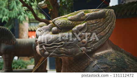 Chengdu, Sichuan, China. Stone Sculptures Of Kylins Or Qilin At Tomb Passage In Wuhou Memorial Temple. Kylins Is Mascot Dragon In China. Qilin Legendary Hooved Chimerical Creature That Appears In Chengdu, Sichuan, China. Stone Sculptures Of Kylins Or Qilin At Tomb Passage In Wuhou Memorial Temple. Kylins Is Mascot Dragon In China. Qilin Legendary Hooved Chimerical Creature That Appears In 131112472