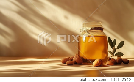 Argan oil on jar organic natural extract nut with shadow light 131112540