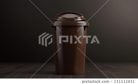 Brown plastic waste garbage container on dark wall 131112831