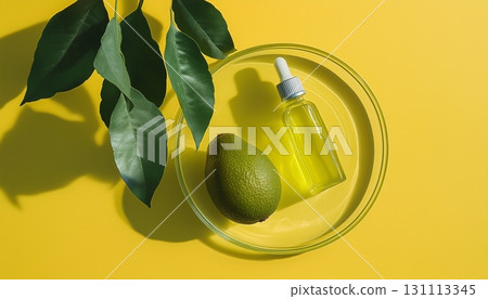 Bottle avocado oil extract on glassware natural ingredient top of view Bottle avocado oil extract on glassware natural ingredient top of view 131113345