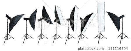 Collection set of professional studio lighting equipment with a softbox on a tripod isolated over a white background 131114294