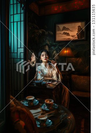 A beautiful Chinese woman in traditional Hanfu delicately applies makeup with a brush, capturing an elegant portrait that highlights cultural heritage, feminine charm, and timeless Asian beauty 131115635