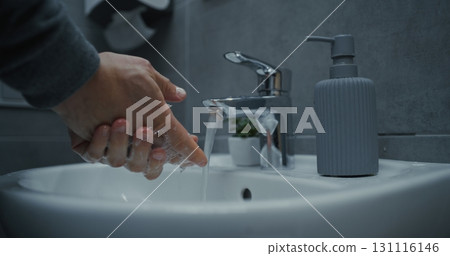 Businessman Cleaning and Washing His Hands. Hand Hygiene after Using the Toilet 131116146