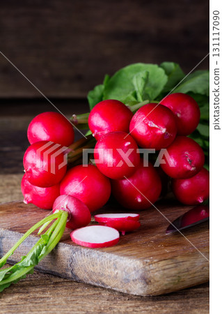 Fresh red radish and kitchen board Fresh red radish and kitchen board 131117090