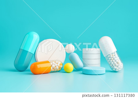 Assorted capsules and tablets in different shapes and colors arranged on blue surface with round pills and granules. Studio still life photography. Healthcare and pharmaceutical concept 131117380