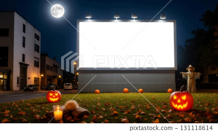mockup of a halloween billboard on a city street at night with pumpkin lanterns and autumn leaves. mockup of a halloween billboard on a city street at night with pumpkin lanterns and autumn leaves. 131118614