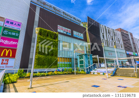Yokohama cityscape in Japan. Don't feed the pigeons! View of Tokyu Plaza and other attractions from the west exit deck of Totsuka Station. Yokohama cityscape in Japan. Don't feed the pigeons! View of Tokyu Plaza and other attractions from the west exit deck of Totsuka Station. 131119678