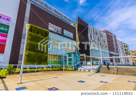 Yokohama cityscape in Japan. Don't feed the pigeons! View of Tokyu Plaza and other attractions from the west exit deck of Totsuka Station. 131119683