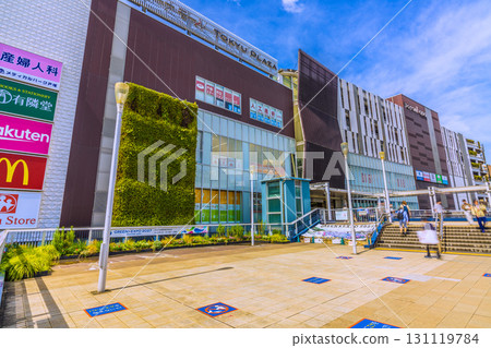 Yokohama cityscape in Japan. Don't feed the pigeons! View of Tokyu Plaza and other attractions from the west exit deck of Totsuka Station. 131119784