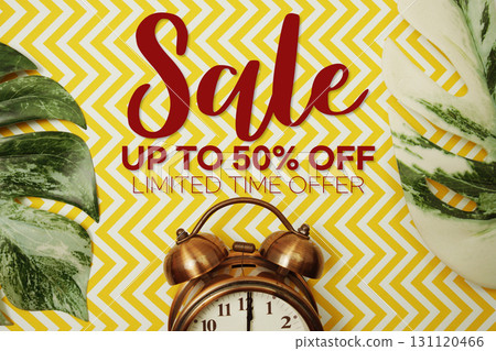 Sale 50% Off text with alarm clock on yellow background 131120466