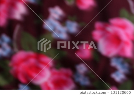 A blurred image of red roses on a black. A blurred image of red roses on a black. 131120600