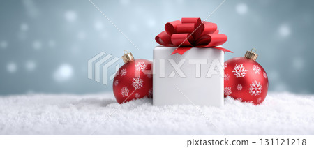 White gift box with red bow on snowy banner winter scene smiling festive mood 131121218