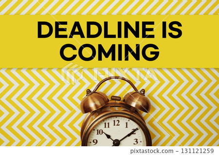 Deadline is Coming text with alarm clock on yellow background 131121259