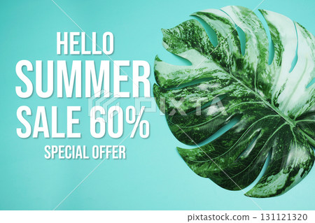 Hello Summer Sale 60% Special Offer with monstera leaf on blue background Hello Summer Sale 60% Special Offer with monstera leaf on blue background 131121320