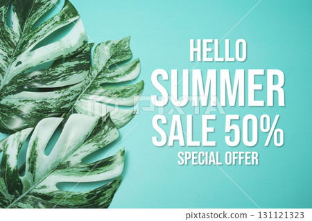 Hello Summer Sale 50% Special Offer with monstera leaf on blue background 131121323