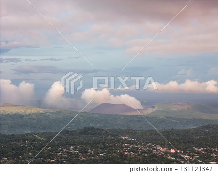 Scenic view of volcanic landscape under cloudy sky 131121342