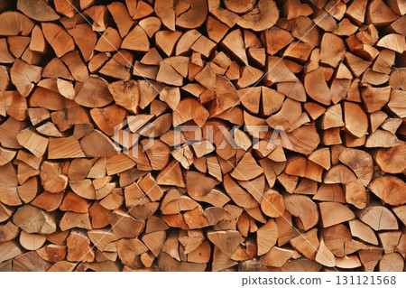 Neatly stacked firewood in countryside shed Neatly stacked firewood in countryside shed 131121568