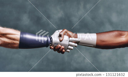 Human hand shaking robotic hand 131121632