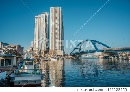 Sokcho harbor with fishing boats and modern skyscrapers, South Korea 131122353