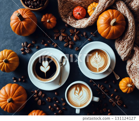 Autumn-Themed Coffee Cups with Pumpkins and Cozy Decorations. 131124127