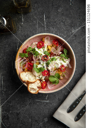 Colorful vegetable salad with radish and tomatoes 131124696