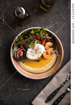 Bowl with hummus, egg, shrimp and salad Bowl with hummus, egg, shrimp and salad 131124704