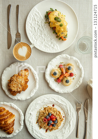 Top view of breakfast table with gourmet dishes Top view of breakfast table with gourmet dishes 131124715