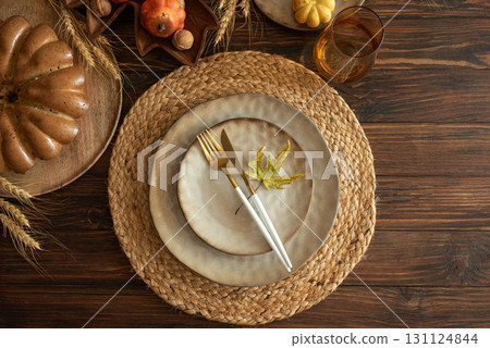 Rustic Fall Table Setting with Pumpkins and Harvest Decor for Thanksgiving 131124844