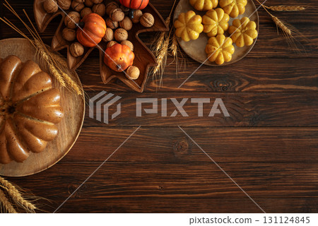 Autumn Harvest Table with Bundt Cake, Pumpkin Cookies and Seasonal Decor Autumn Harvest Table with Bundt Cake, Pumpkin Cookies and Seasonal Decor 131124845