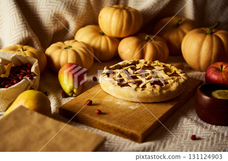 Autumn Harvest Pie Scene With Pumpkins, Apples, and Cranberries for Thanksgiving and Fall Decor Autumn Harvest Pie Scene With Pumpkins, Apples, and Cranberries for Thanksgiving and Fall Decor 131124903