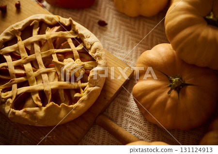 Autumn Pumpkin Pie Lattice Pie On Rustic Table With Fresh Pumpkins And Harvest Mood Autumn Pumpkin Pie Lattice Pie On Rustic Table With Fresh Pumpkins And Harvest Mood 131124913