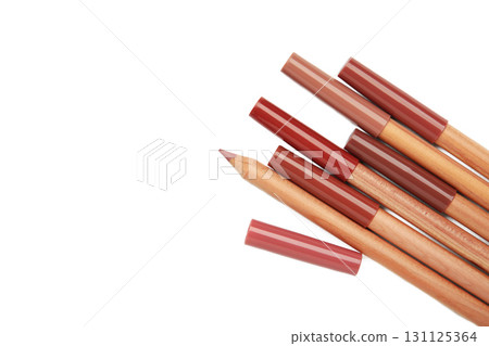 Different lip pencils isolated on white background. Cosmetic product 131125364