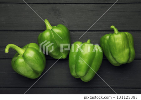 Macro Photo food vegetable green bell peppers on black background. 131125385