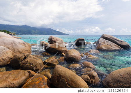 Mahe island, Seychelles. Serene tropical coastline with large granite stones 131126854